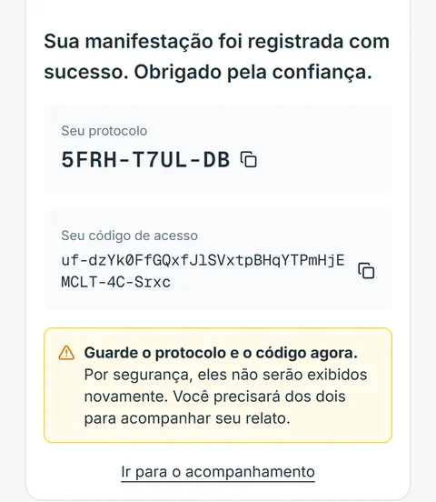 Tela de confirmação com o protocolo e o código de acesso do relato.